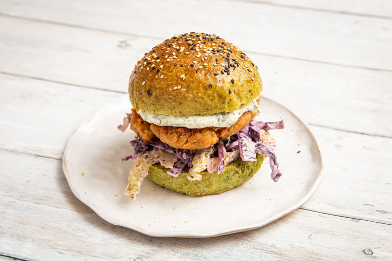 Cajun-spiced salmon burgers with lime coleslaw and spinach buns