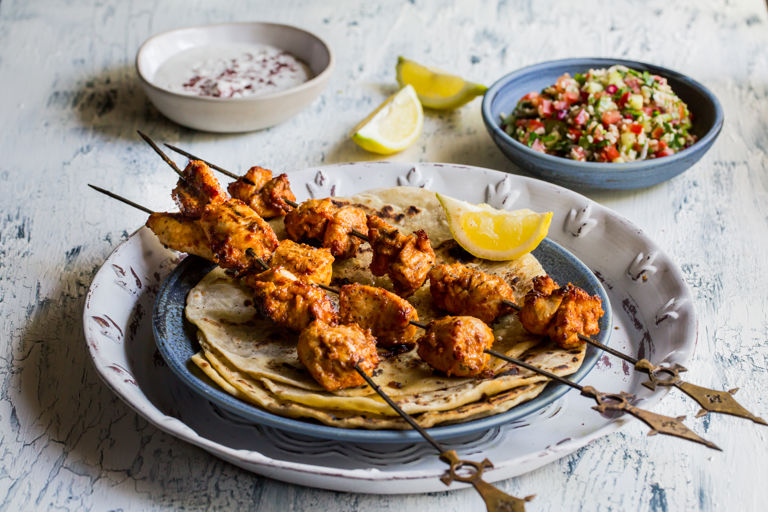 Tahini-marinated chicken with tabbouleh and flatbreads