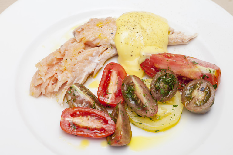 Barbecued trout cooked in newspaper