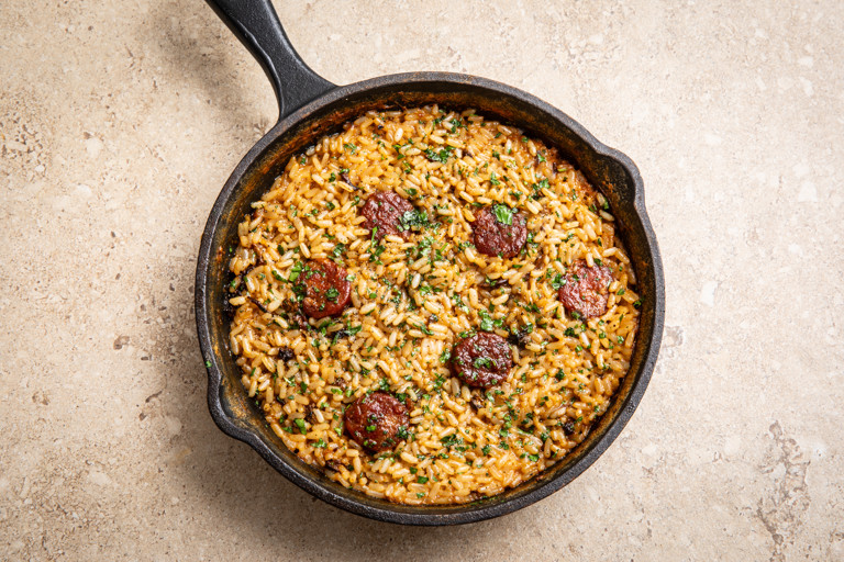 Baked rice with chorizo and dried porcini mushrooms