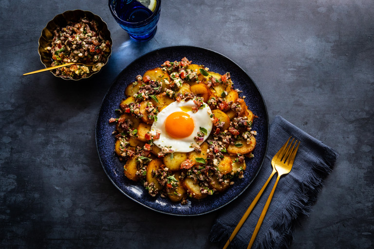 Greek potatoes with fried eggs and feta