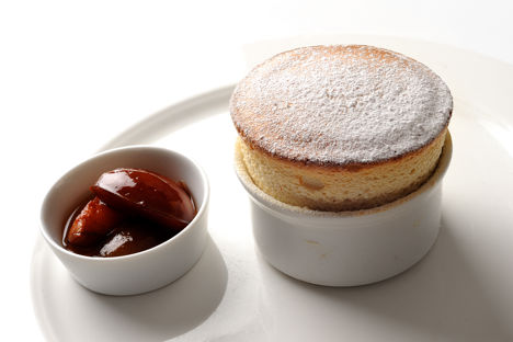 Mirabelle soufflé with poached plums