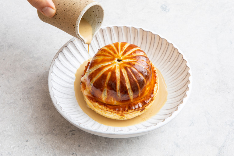 Pithivier of potato, portobello mushroom and Gruyère, braised leeks and mushroom bisque