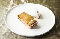 Plum and hazelnut tart with meadowsweet ice cream