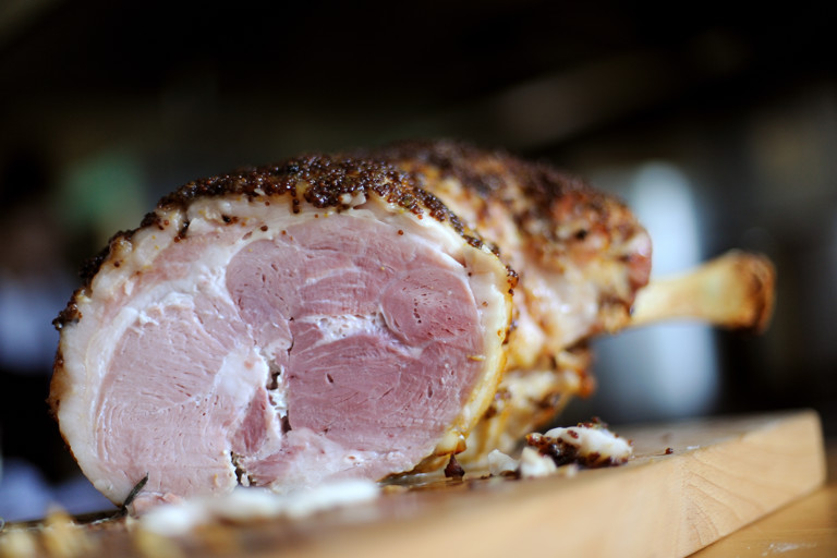 Honey mustard glazed ham studded with cloves and parsley sauce