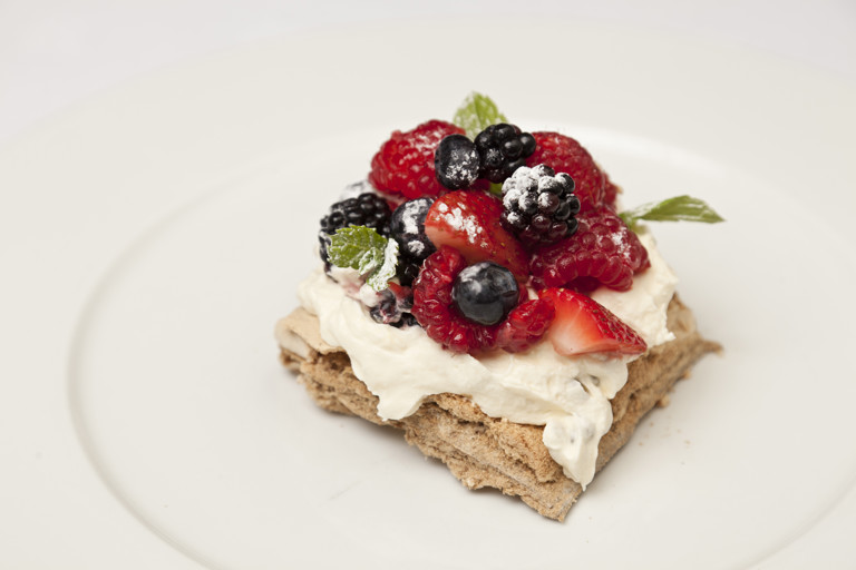 Coffee meringue with passion fruit cream and summer fruits