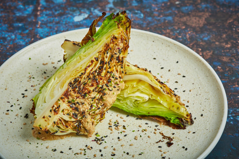 Barbcued hispi cabbage with miso butter and goma dressing