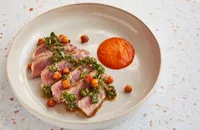 Iberico pork presa with chimichurri and red pepper purée