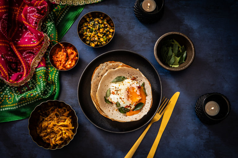 Egg hoppers with garlic and red pepper chutney, onion relish and corn relish 