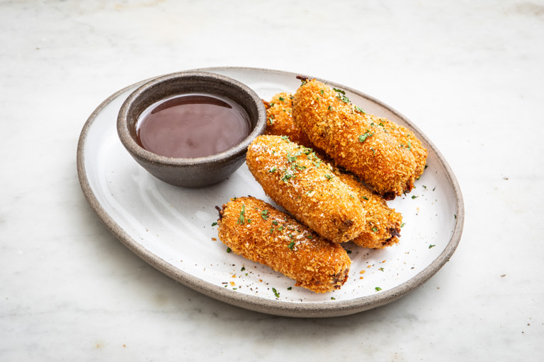Potato and lamb croquettes with red wine jus dip 