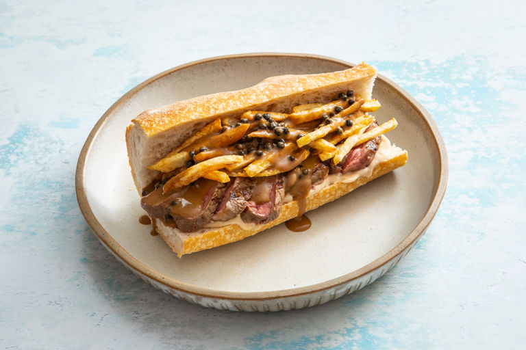Steak frites sandwich with peppercorn sauce mayo