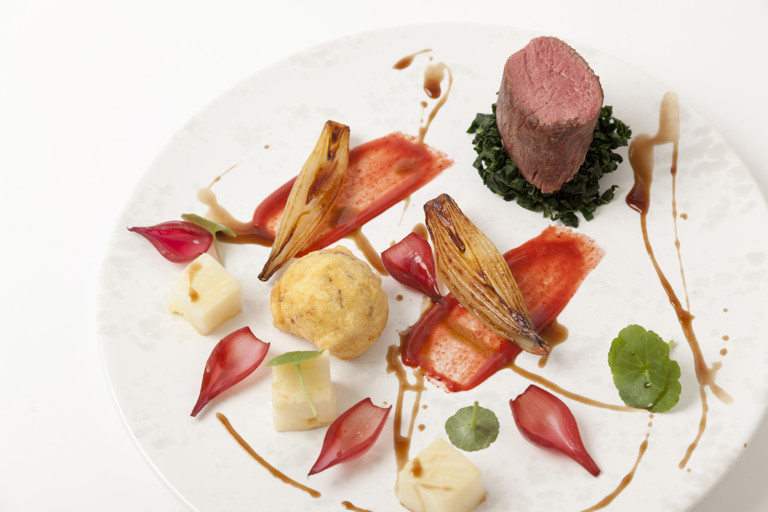 Saddle of venison with shallots, salt baked celeriac and venison sauce
