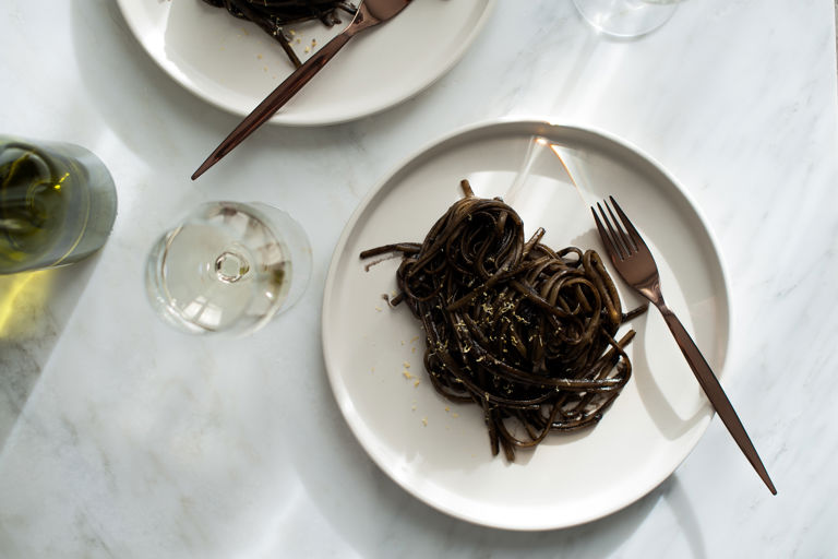 Linguine with squid ink sauce and lemon