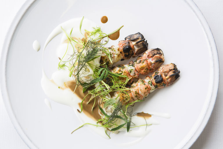 Chargrilled langoustines, bisque, buttermilk and pickled fennel