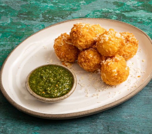 Aligot croquettes with herb dipping oil