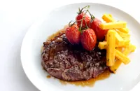 Rib-eye of beef with polenta chips