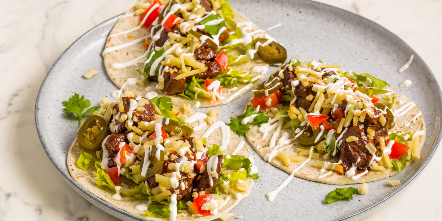 Sous vide venison tacos with ancho chilli and bitter chocolate