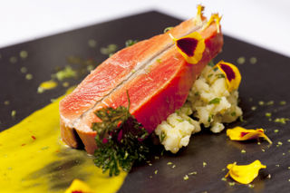 Pan-roasted Alaska salmon steaks with lime and coriander mayonnaise and warm crushed potatoes