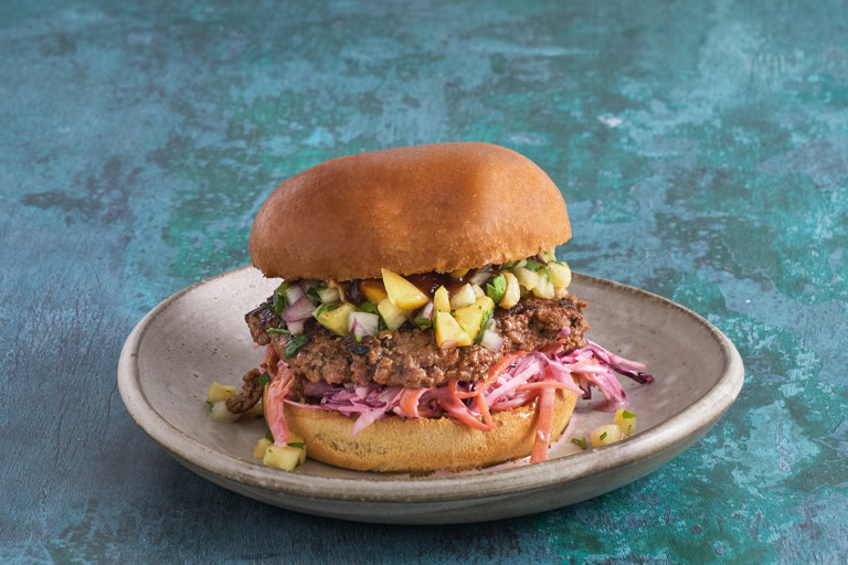 Jerk smash burgers with pineapple mango salsa and lime slaw