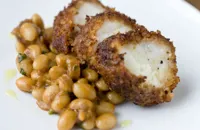 Monkfish with chorizo crust and spiced beans