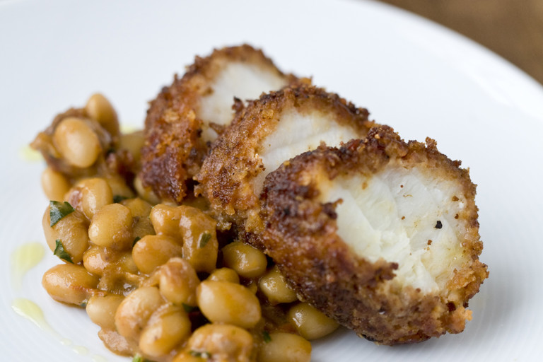Monkfish with chorizo crust and spiced beans