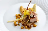 Roast suckling pig with roast pineapple and baby squid