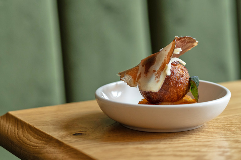 Belfast blue cheese and Bramley apple doughnut with crispy potato cake and coppa