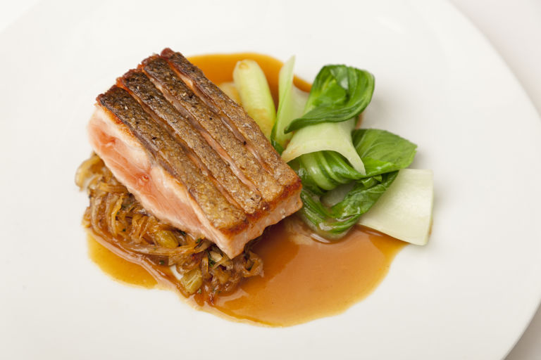 Crispy Alaska salmon with sweet and sour cabbage and spicy sauce