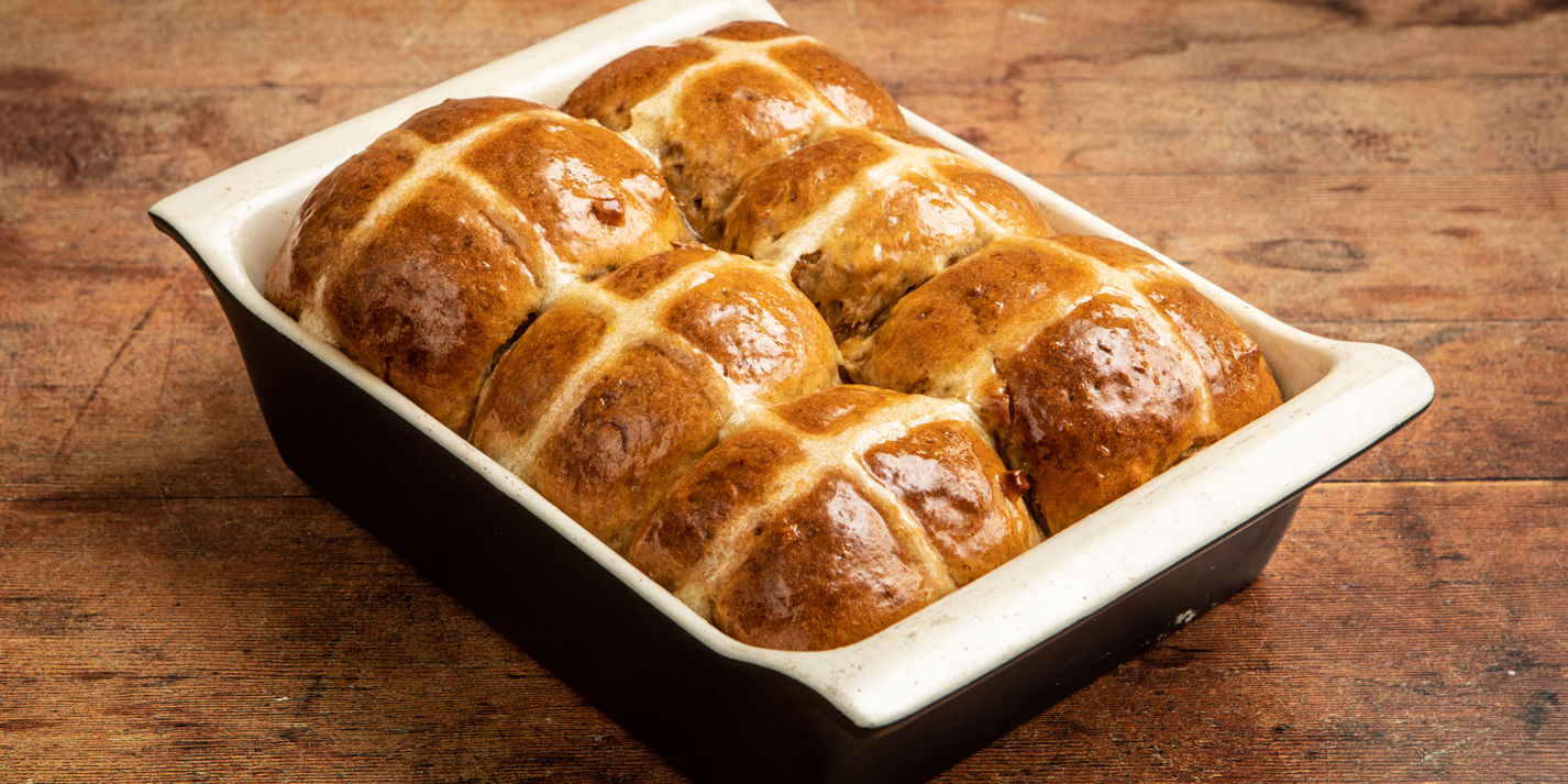 Caramelised apple and cinnamon hot cross buns with ginger glaze - Great British Chefs