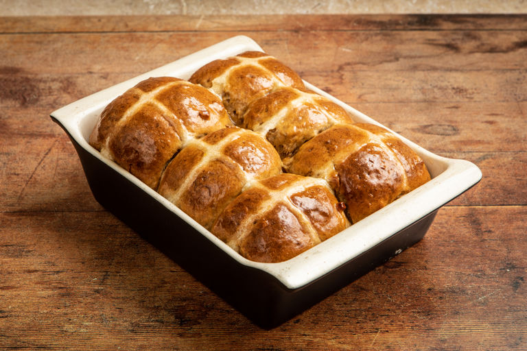 Caramelised apple and cinnamon hot cross buns with ginger glaze syrup