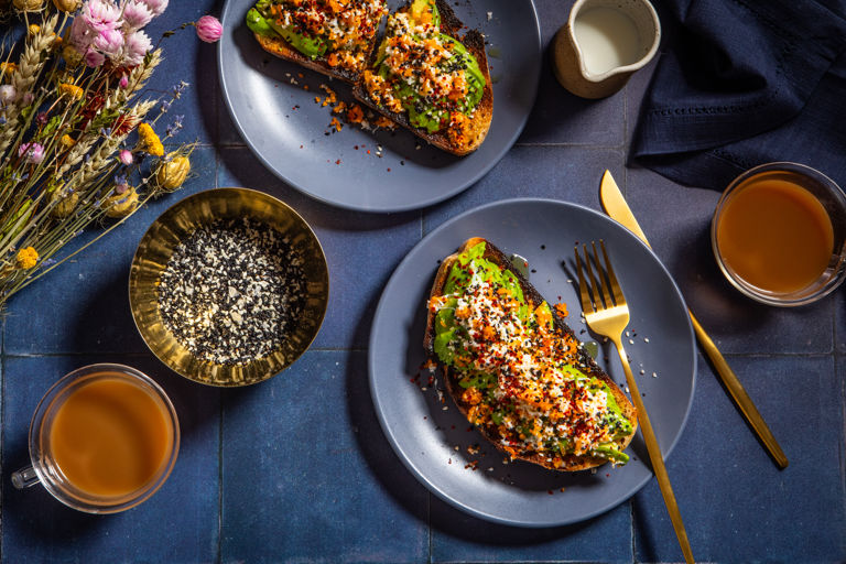 Avocado and grated egg on toast with everything bagel seasoning