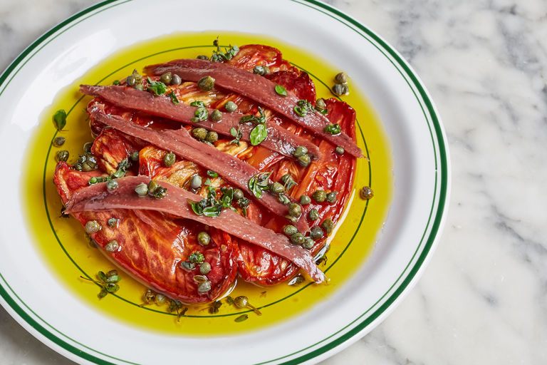 Slow-roasted tomatoes with anchovies, capers and marjoram
