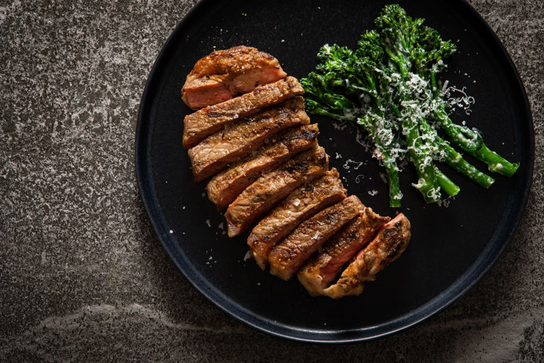 Striploin steak with caesar-dressed tenderstem broccoli