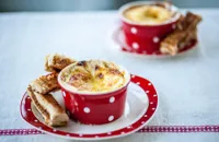 Cheesy baked eggs with Marmite soldiers