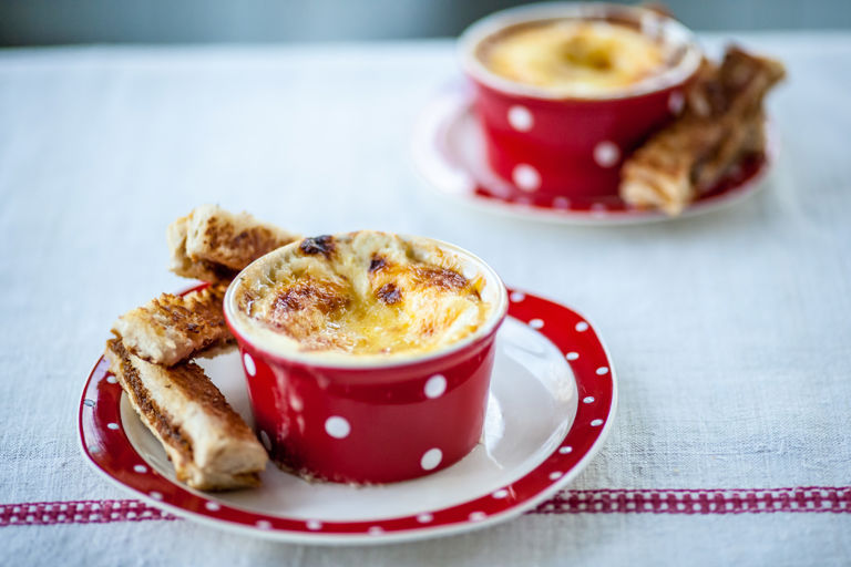 Cheesy baked eggs with Marmite soldiers