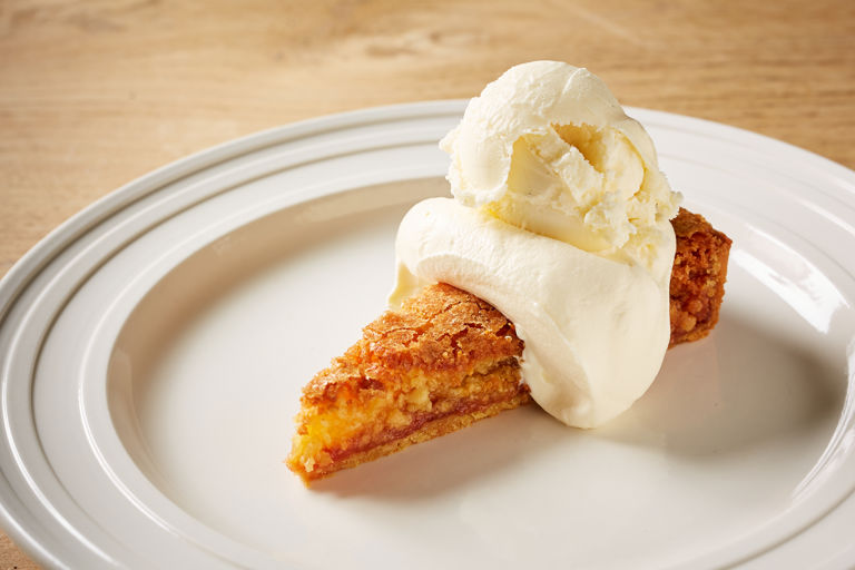 Quince tart with cream and ice cream
