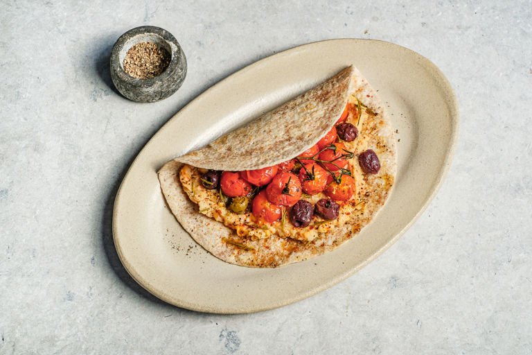Cannellini, roasted cherry tomato and herb-roasted olive piadina  