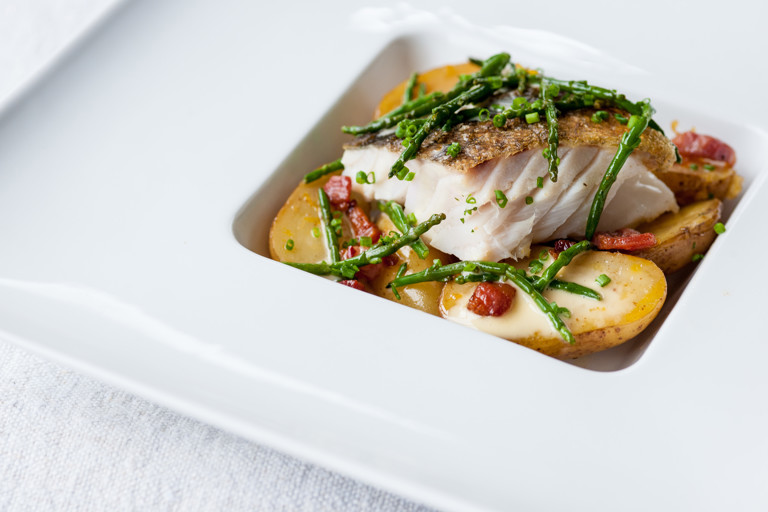 Pan-roast cod with confit Jersey Royals, pancetta, samphire and lemon