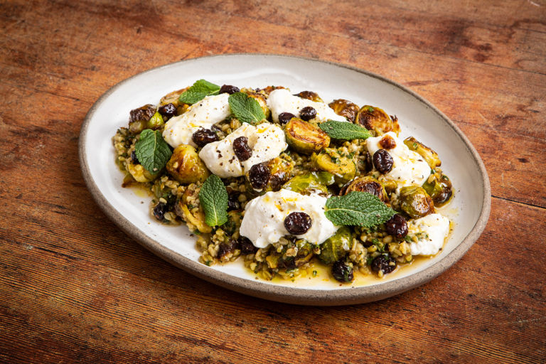 Freekeh with roasted sprouts, ricotta and cranberry-orange dressing