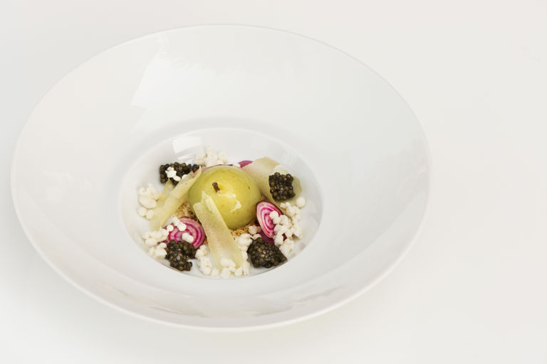 Apple with caviar and iced almond
