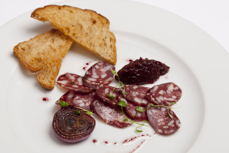 Venison salami with red onion and sloe gin marmalade, grilled sourdough