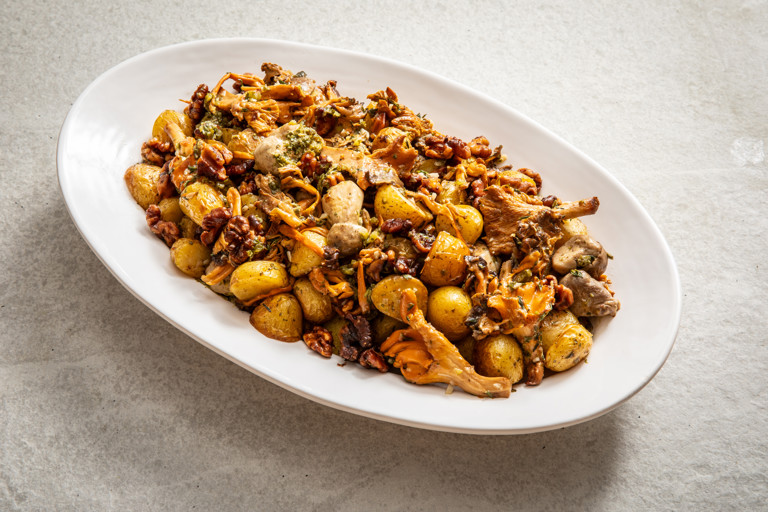 Baby potato salad with wild mushrooms, walnuts and a caper dressing