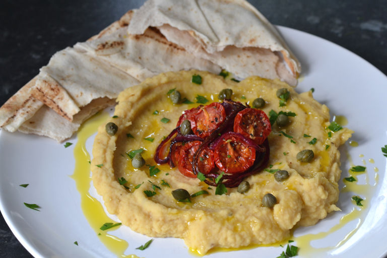 Yellow split pea purée with slow roast Piccolo tomatoes, caramelised onion and capers