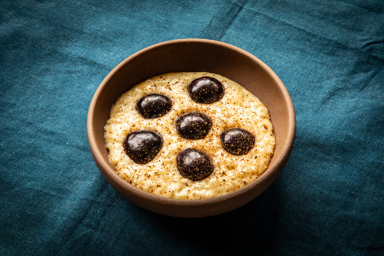 Arroz con leche (rice pudding) with cherries and rompope (eggnog)