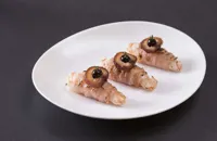 'Shrimp in mink' - langoustines wrapped in pancetta with date puree