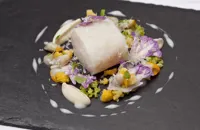Confit pollock with cauliflower, cockles and Parmesan