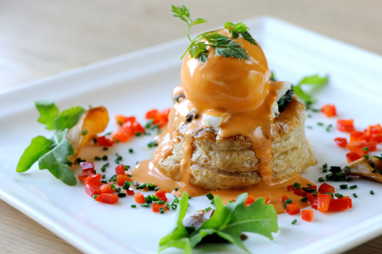 Wild mushroom, spinach and goat's cheese vol-au-vents with poached duck egg and pimento cream