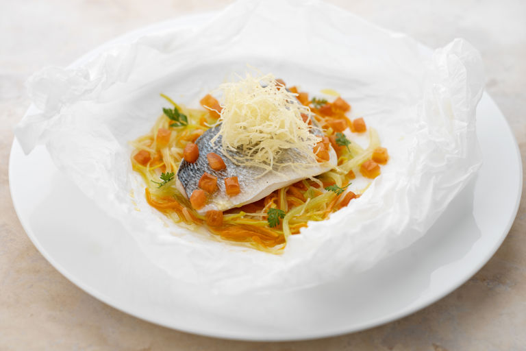 Sea bream with glazed vegetables, straw potatoes and gourmand vinaigrette