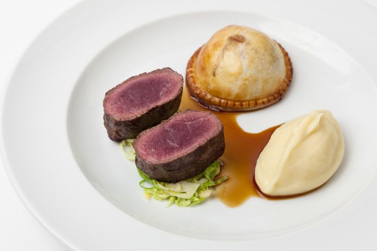Roast loin of venison, wild mushroom pie and parsnip purée