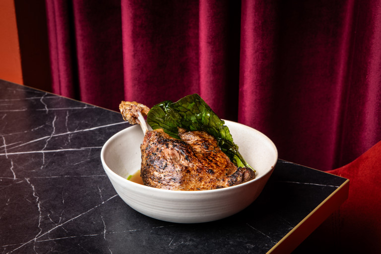 Spiced duck leg confit in pepe soup broth